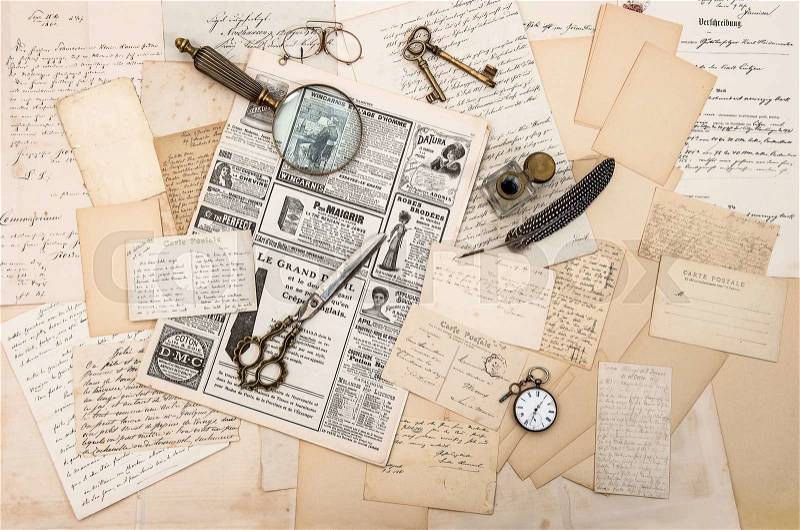 Vintage office tools, old letters, newspapers and postcards, stock photo