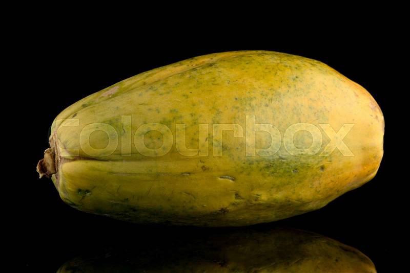Papaya isolated on a black background, stock photo