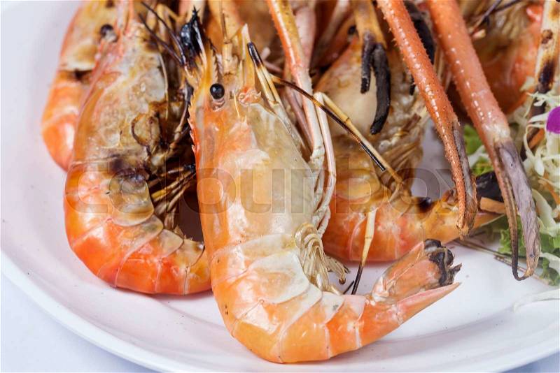 Grilled shrimps on the plate / Thai river prawn, stock photo