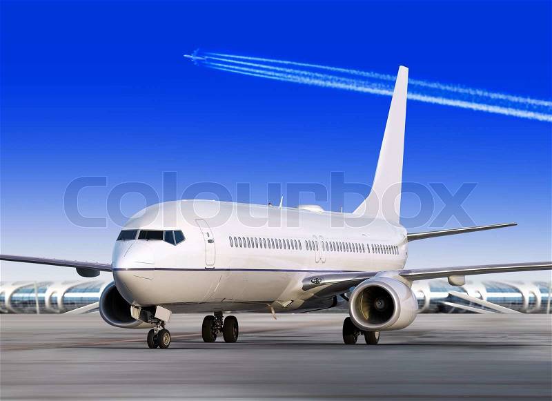 Passenger airplane is landing to runway of airport, stock photo