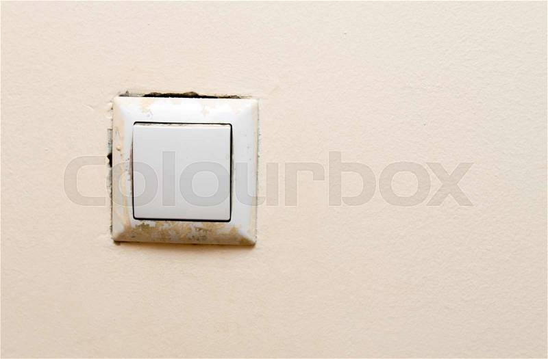 Switch on the wall as background, stock photo