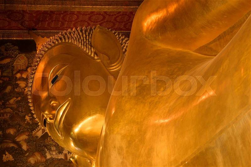 Close up Reclining Buddha gold statue. Wat Pho, Bangkok, Thailand, stock photo