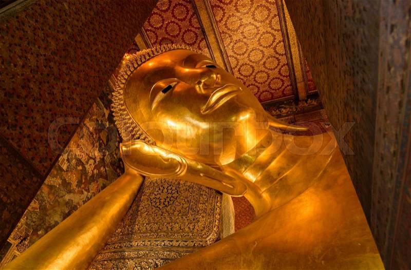 Reclining Buddha gold statue. Wat Pho, Bangkok, Thailand, stock photo