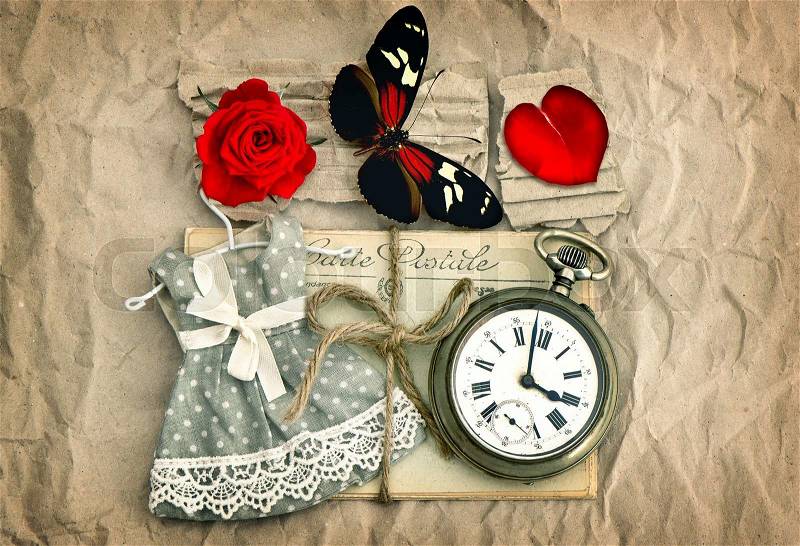 Love postcards, red rose flower, vintage pocket watch, valentine heart. Retro style toned picture, stock photo