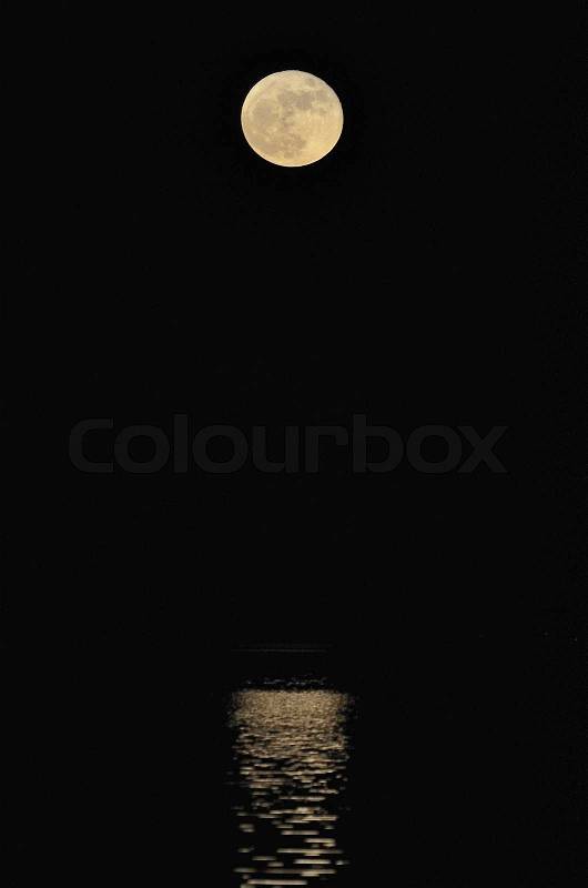 Moonlight reflecting in water, stock photo