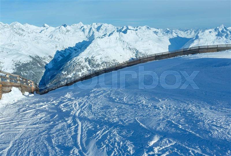 Scenery from the ski run top at the snowy slopes (Tyrol, Austria), stock photo