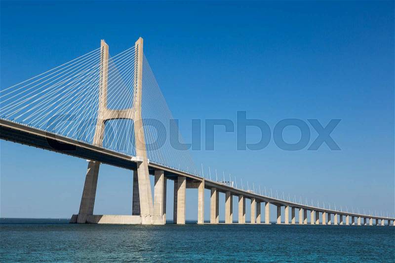 The Vasco da Gama Bridge in Lisbon, Portugal in a summer day, stock photo