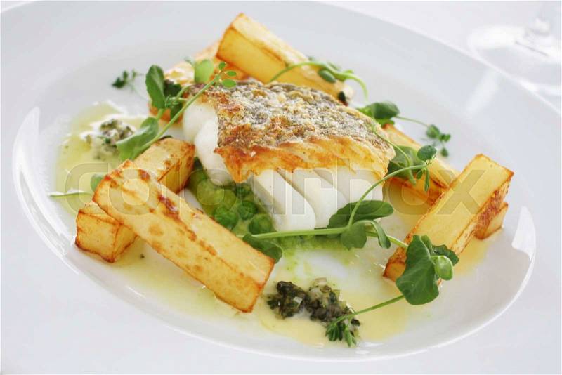 Gourmet fish and chips with mush peas meal, stock photo