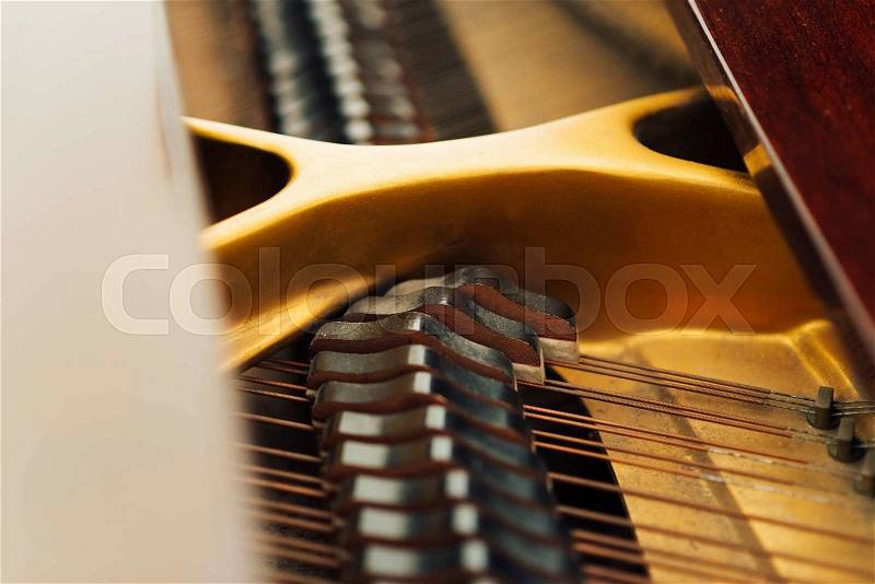 String mechanism in the old piano, stock photo