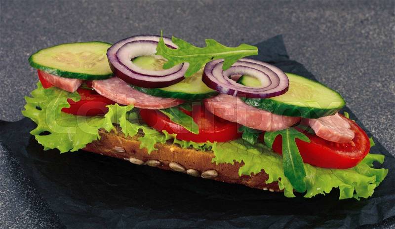 Retro food: Fresh sandwich with lettuce, tomato and onion. Studio Photo, stock photo