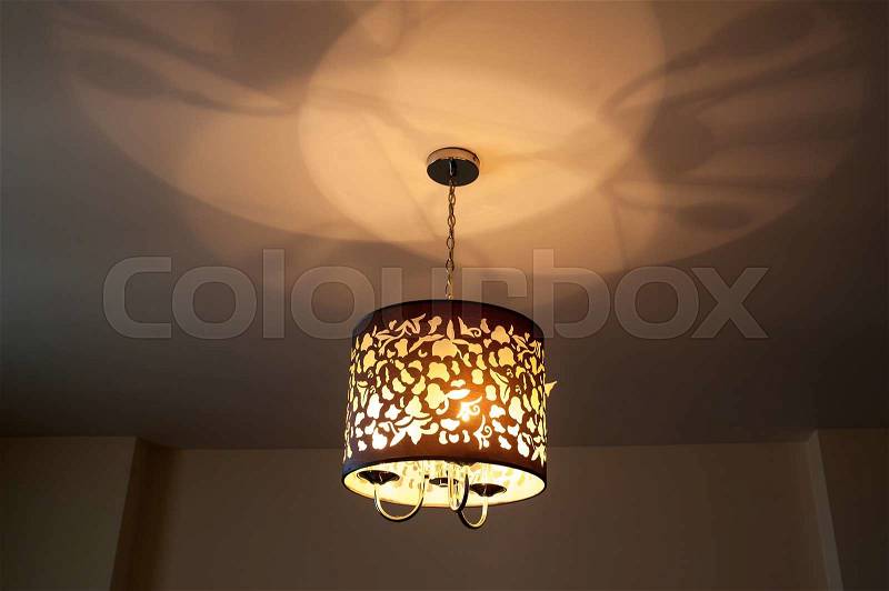 Beautiful lighting lamp in the room of hotel, stock photo