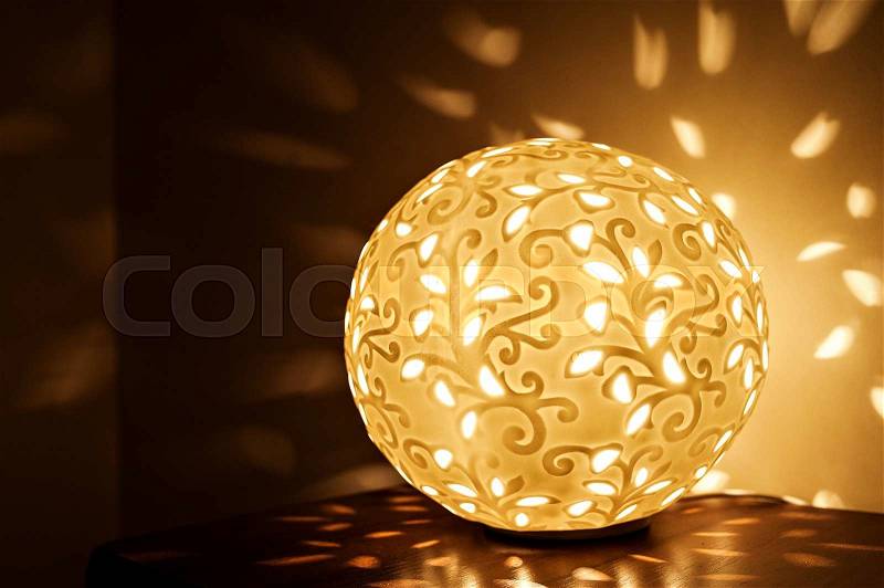 Beautiful lighting lamp in the room of hotel, stock photo