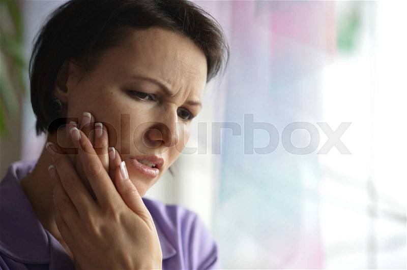 Portrait of Sick woman with tooth pain, stock photo