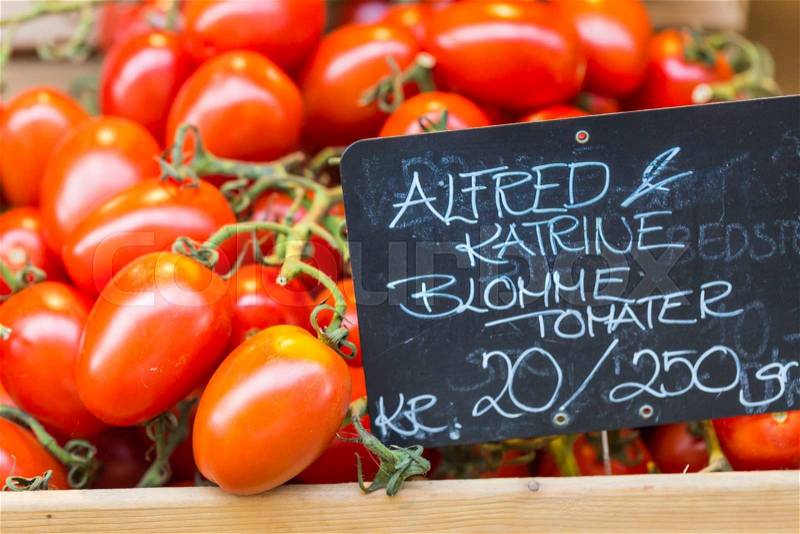 Just harvested tomatoes for sale at local farm market. Copenhagen, Denmark. , stock photo