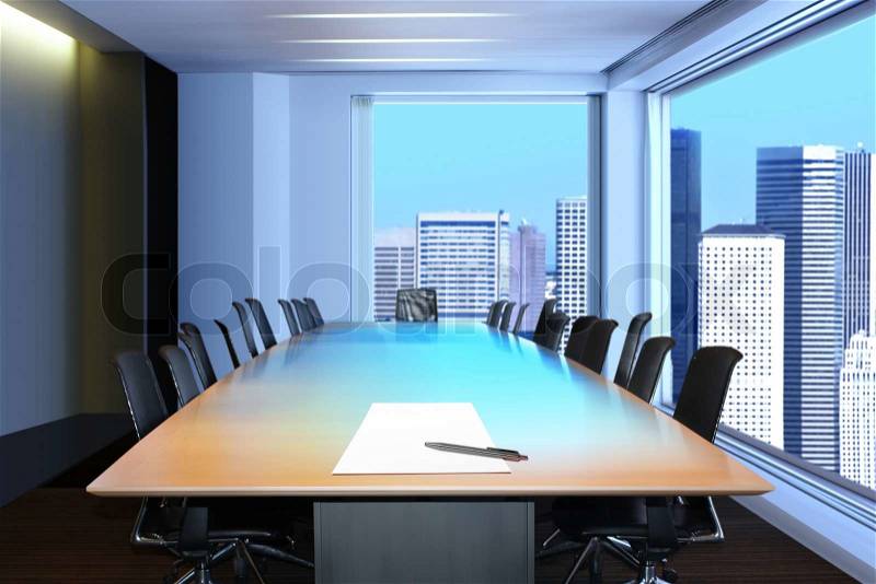 Meeting room, in front focus placed sheet of paper and pen on table, stock photo