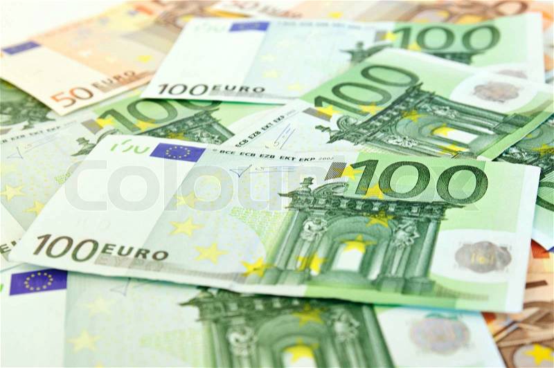 Background from a lot of euro banknotes, shallow depth of field, stock photo