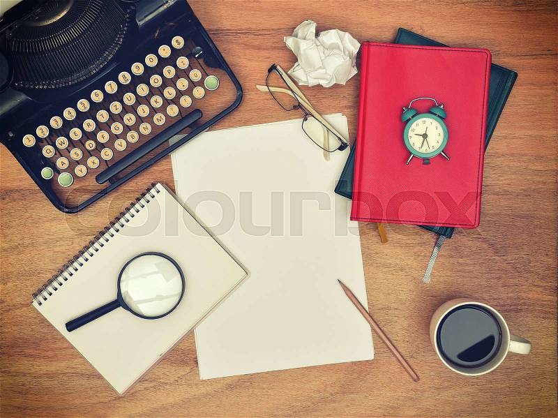 Blank sheet of paper on the desk writer. Vintage effect, stock photo