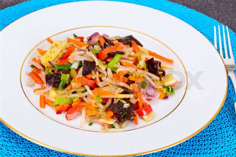Healthy, diet: Mushrooms mun, bamboo shoots, soy sprouts, peppers and leeks with squid. Studio Photo, stock photo