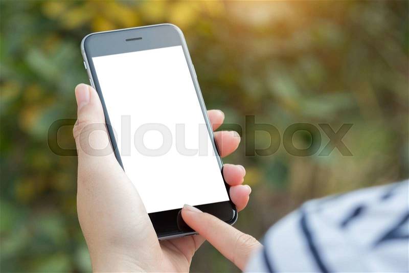 Close up hand using phone white screen, stock photo