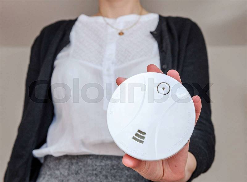 Demonstratin smoke detector - the device that senses smoke, typically as an indicator of fire, stock photo