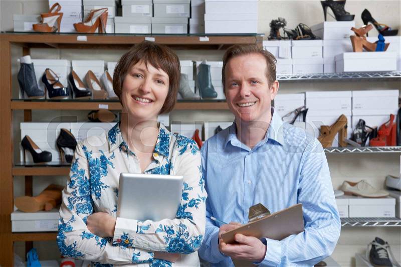 Couple Running Online Shoe Business, stock photo