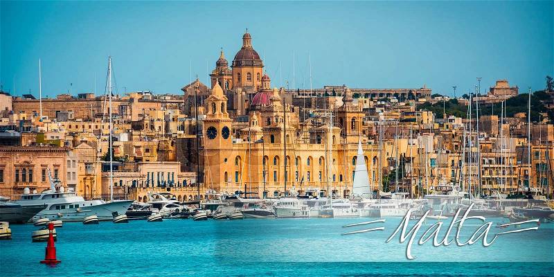Postcard with view on Birgu coast from the sea in Malta, stock photo