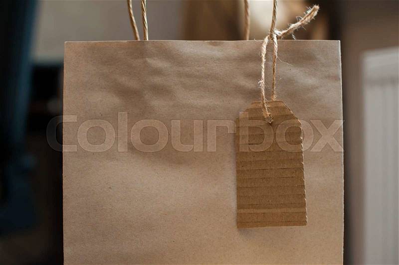 Brown kraft paper bag for gift and paper tag, stock photo