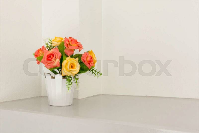 Flower on white table corner, stock photo