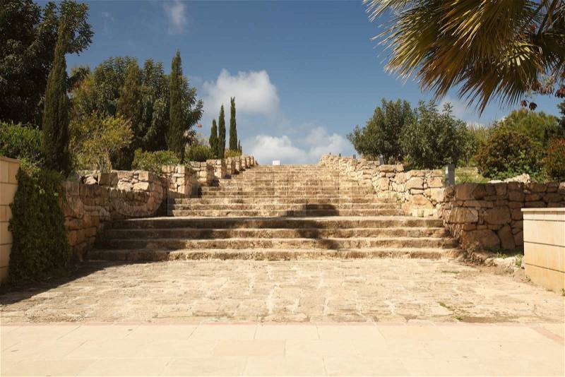 Ancient stone staircase at the entrance to the park in Cyprus. Summer , stock photo