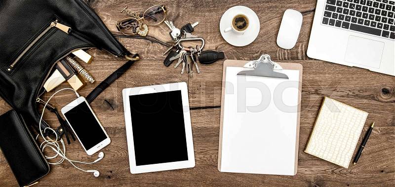 Office desk table. Feminine fashion mockup with office supplies, cosmetics and gadgets, stock photo