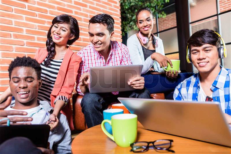 Group of diversity college students learning on campus, Indian, black, and Indonesian people, stock photo