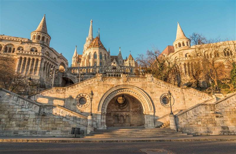 Sunlit Fisherman\'s Bastion in Budapest, Hungary at Sunrise. View from below, stock photo