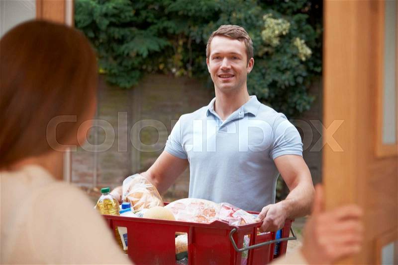 Driver Delivering Online Grocery Shopping Order, stock photo