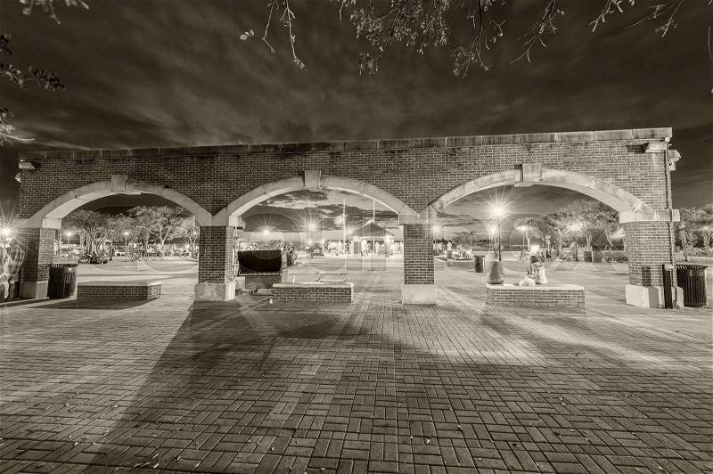 Mallory Square with ancient arch at night, Key West, stock photo