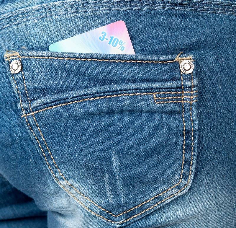Jeans pocket with a discount card, stock photo