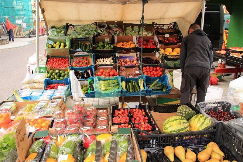 Stand from the grocer with fruit and vegetable at the market in the village Macroom in Ireland in the summer, stock photo