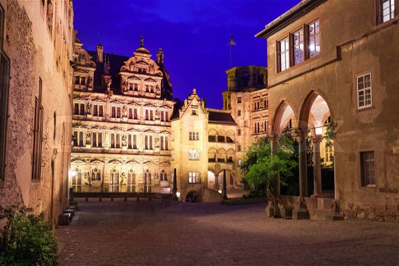 Inner yard view of Schloss Heidelberg during night time in Heidelberg, Germany, stock photo