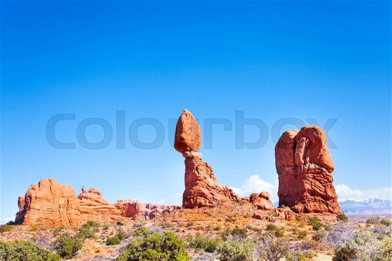 Balancing rock in Arches National Park, USA during sunny summer day, stock photo