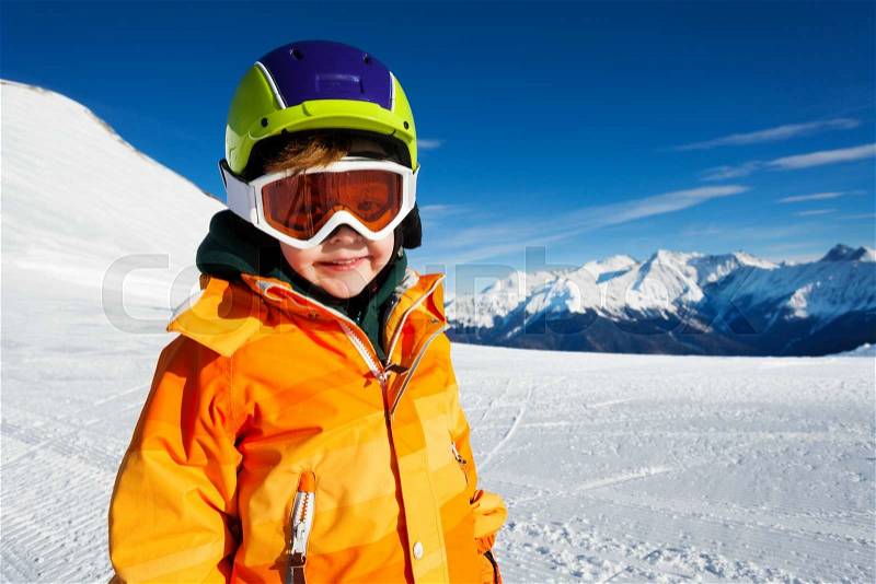 Close-up view of boy wearing ski mask on ski-track of Sochi ski resort Krasnaya polyana, Russia, stock photo
