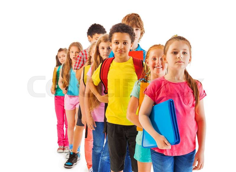 Front view of the line of boys and girls standing in a queue African black and Caucasian, stock photo