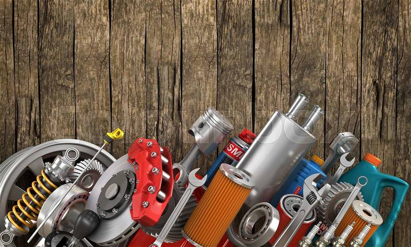 Set of auto parts on the old wood background, stock photo