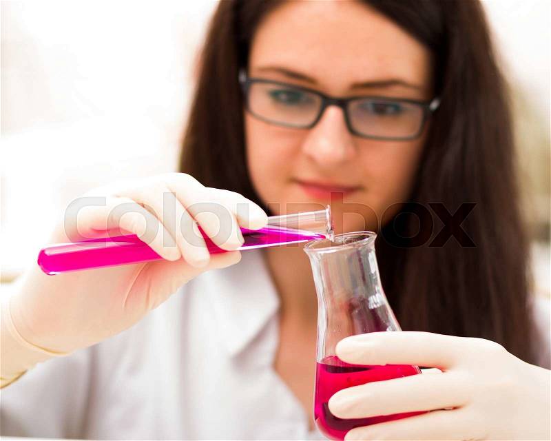 Sweet yound woman being aware in analysis with poisonos chemical substances, stock photo