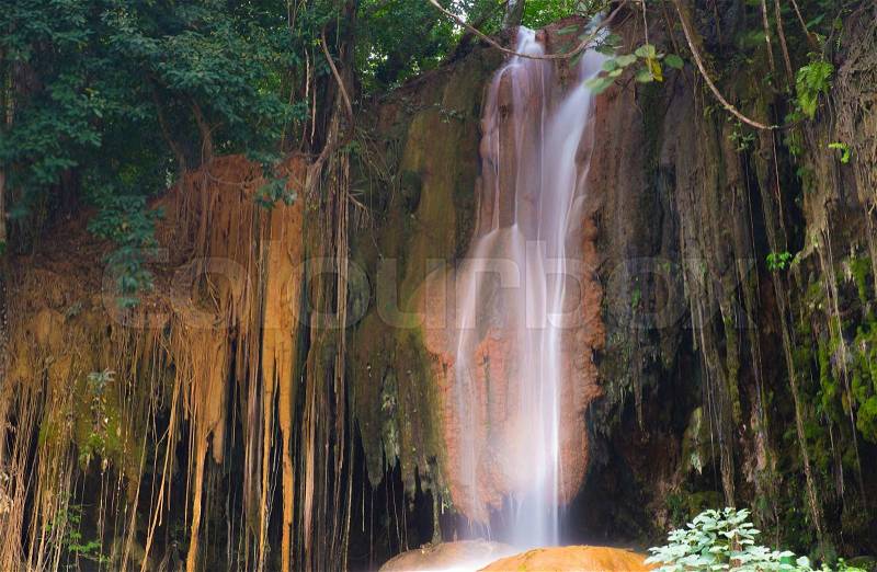 Phu Sang waterfall with water only in Thailand. -36 To 35 degree Celsius water temperatures that flows from a limestone cliff 25 meters high, stock photo