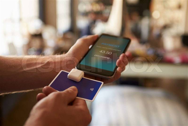 Credit Card Payment App Attached To Mobile Phone, stock photo
