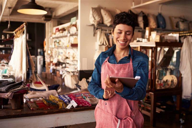 Female Owner Of Gift Store With Digital Tablet, stock photo