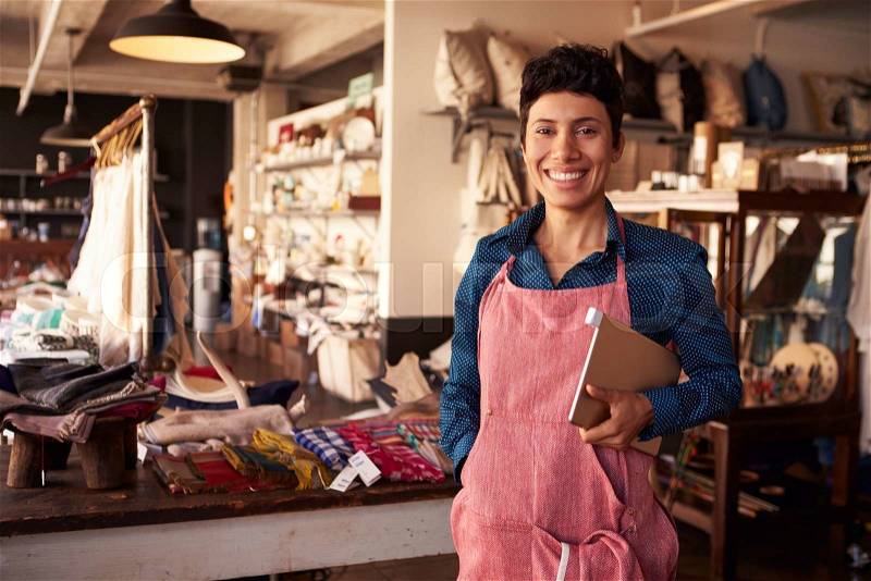 Portrait Of Female Owner Of Gift Store With Digital Tablet, stock photo