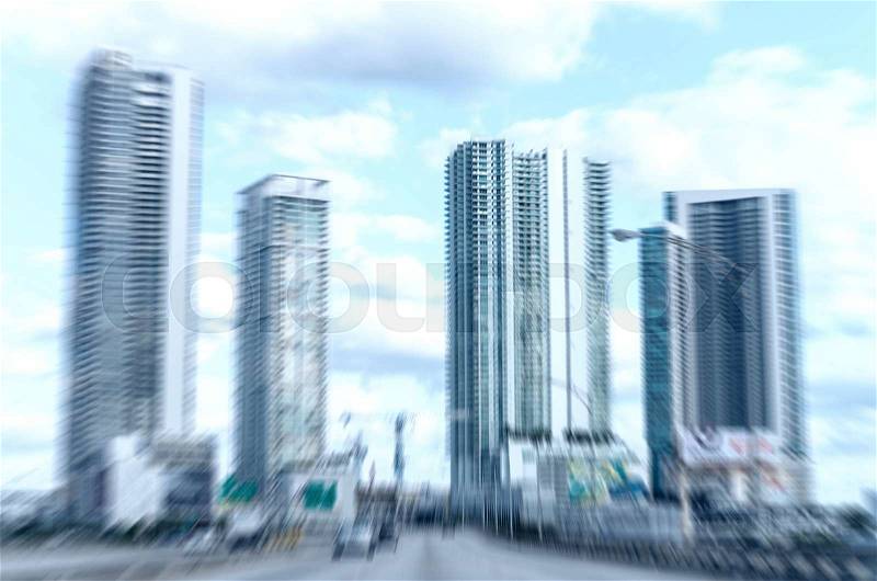 Blurred image of Miami buildings as seen from a moving car, stock photo