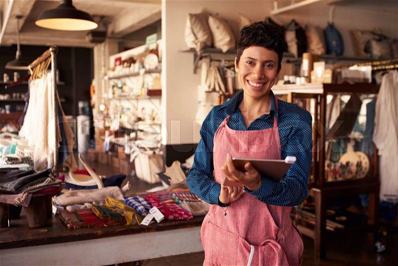 Portrait Of Female Owner Of Gift Store With Digital Tablet, stock photo