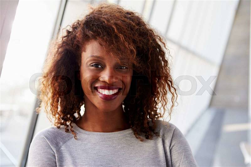 Portrait Of African American Businesswoman In Modern Office, stock photo