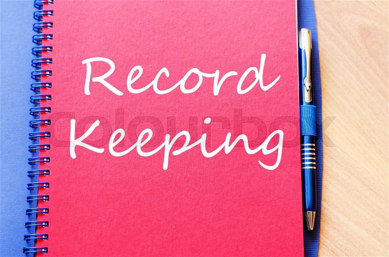 Record keeping text concept write on notebook with pen, stock photo